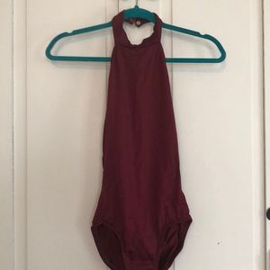 Motionwear dark maroon leotard. Size S
